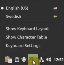 Keyboard layouts manager in system tray Linux Mint 20.